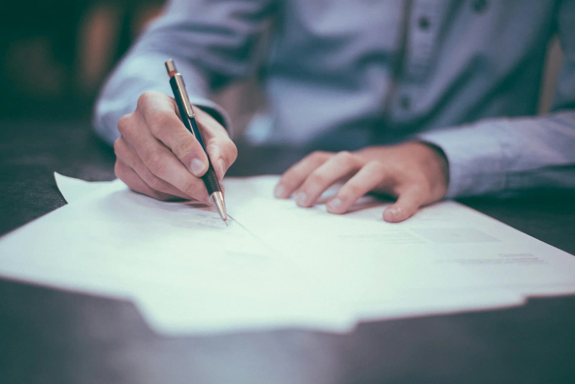 Legal documents and contract papers on a desk