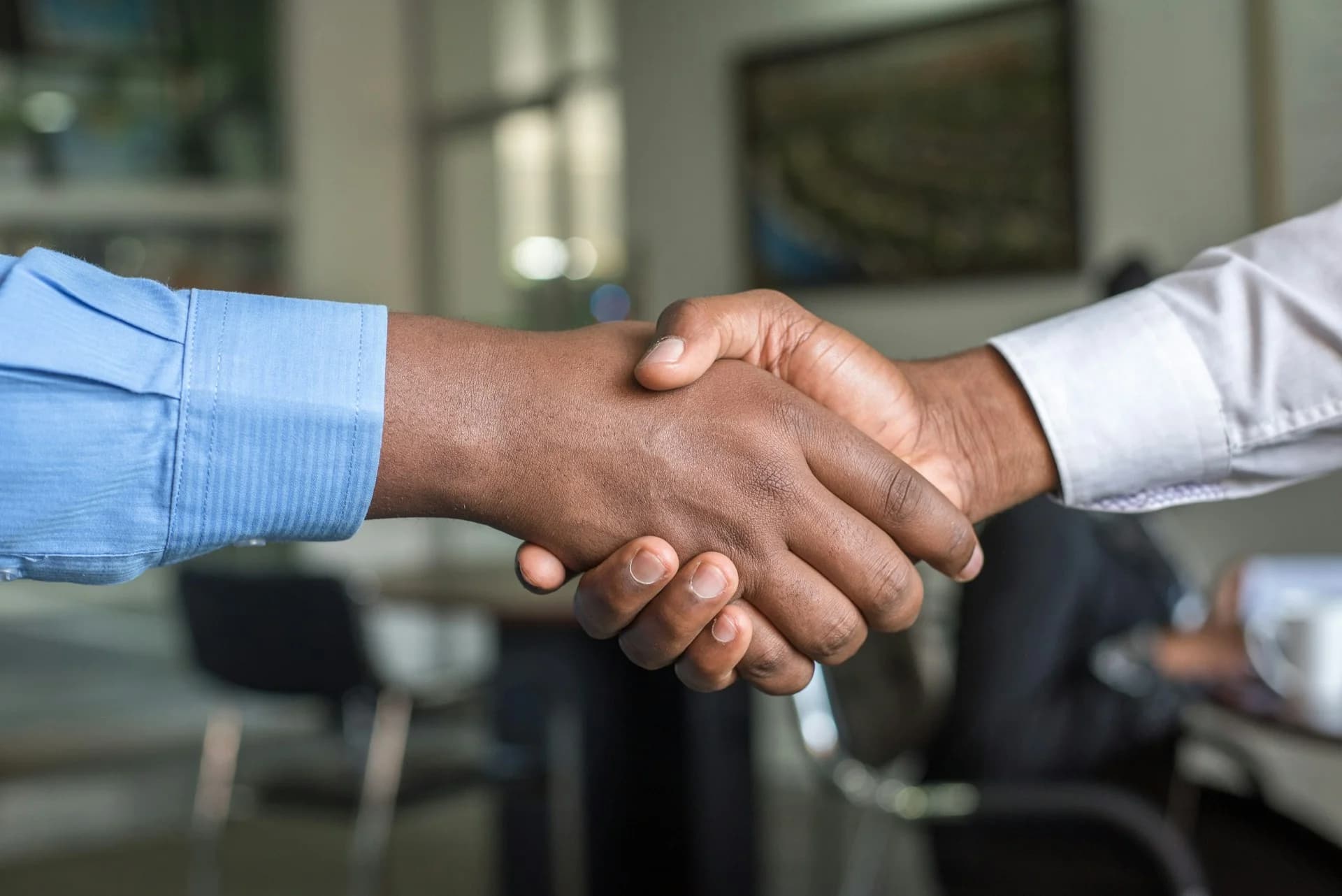 Professional handshake closing a partnership